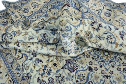 Backside of handmade 2000s Nain rug showing knot structure and weave density