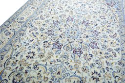Backside of handmade 2000s Nain rug showing knot structure and weave density