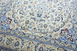 Close-up detail of 2000s Nain rug from Iran / Persia showing Wool weave