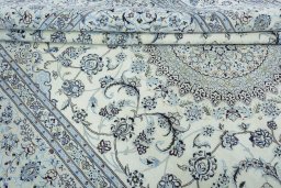 Close-up detail of New Nain rug from Iran / Persia showing Wool weave