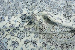 Surface texture of New Nain rug with natural Wool and intricate pattern