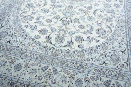 Close-up detail of New Nain rug from Iran / Persia showing Wool weave