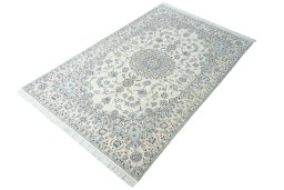 Corner detail of New Nain rug showing border pattern and Cork pile