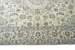 Corner detail of New Nain rug showing border pattern and Cork pile