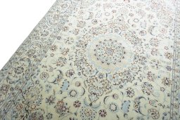 Backside of handmade New Nain rug showing knot structure and weave density
