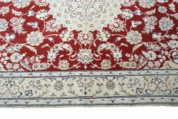 Corner detail of New Nain rug showing border pattern and Wool pile