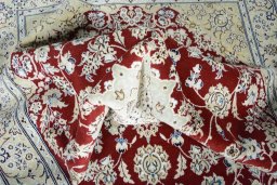 Surface texture of New Nain rug with natural Wool and intricate pattern