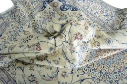 Surface texture of 2000s Nain rug with natural Cork and intricate pattern