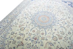 Backside of handmade 2000s Nain rug showing knot structure and weave density