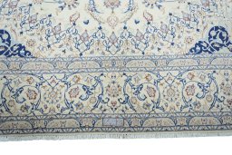 Full view of 2000s Nain rug from Iran / Persia, 375 × 250 cm in Beige tones