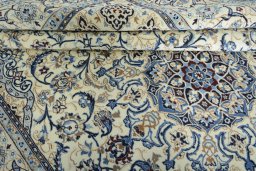 Close-up detail of New Nain rug from Iran / Persia showing Wool weave