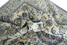 Surface texture of New Nain rug with natural Wool and intricate pattern