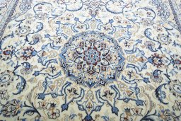 Central medallion detail of New Nain rug from Iran / Persia