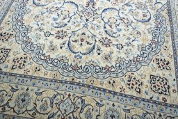 Close-up detail of New Nain rug from Iran / Persia showing Wool weave