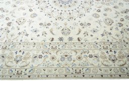 Corner detail of New Nain rug showing border pattern and Wool pile