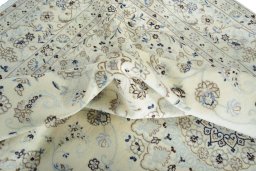 Surface texture of New Nain rug with natural Wool and intricate pattern