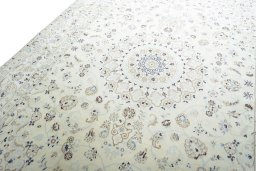 Backside of handmade New Nain rug showing knot structure and weave density