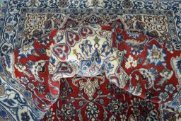 Close-up detail of 2000s Nain rug from Iran / Persia showing Wool weave
