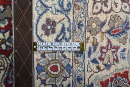 Surface texture of 2000s Nain rug with natural Wool and intricate pattern