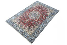 Corner detail of 2000s Nain rug showing border pattern and Wool pile