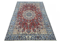 Surface texture of 2000s Nain rug with natural Wool and intricate pattern