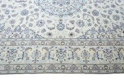 Corner detail of New Nain rug showing border pattern and Wool pile