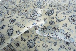 Surface texture of New Nain rug with natural Wool and intricate pattern