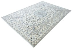 Corner detail of New Nain rug showing border pattern and Wool pile