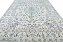 Surface texture of New Nain rug with natural Wool and intricate pattern