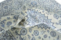 Surface texture of New Nain rug with natural Wool and intricate pattern