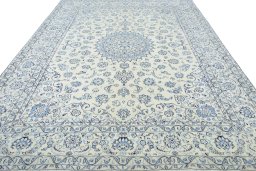 Surface texture of New Nain rug with natural Wool and intricate pattern