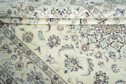 Close-up detail of 2000s Nain rug from Iran / Persia showing Wool weave