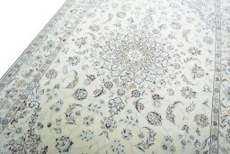 Backside of handmade 2000s Nain rug showing knot structure and weave density