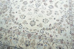 Close-up detail of 2000s Nain rug from Iran / Persia showing Wool weave