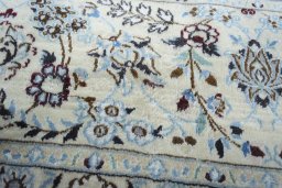 Close-up detail of New Nain rug from Iran / Persia showing Wool weave