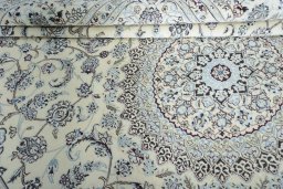 Surface texture of New Nain rug with natural Wool and intricate pattern