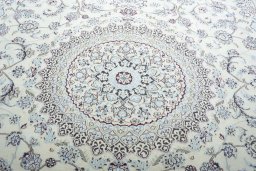 Central medallion detail of New Nain rug from Iran / Persia