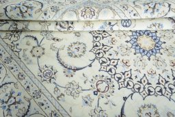 Close-up detail of 2000s Nain rug from Iran / Persia showing Wool weave