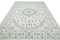 Surface texture of 2000s Nain rug with natural Wool and intricate pattern