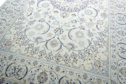 Close-up detail of 2000s Nain rug from Iran / Persia showing Wool weave