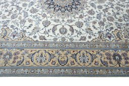 Corner detail of New Nain rug showing border pattern and Cork pile