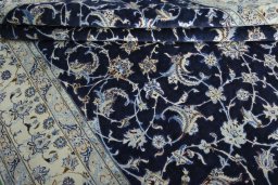 Close-up detail of 2000s Nain rug from Iran / Persia showing Wool weave