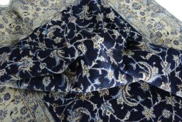 Surface texture of 2000s Nain rug with natural Wool and intricate pattern