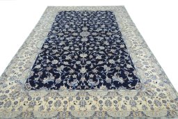 Surface texture of 2000s Nain rug with natural Wool and intricate pattern