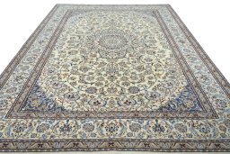 Surface texture of 2000s Nain rug with natural Wool and intricate pattern