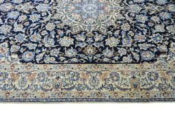 Corner detail of 1970s Nain rug showing border pattern and Cork pile
