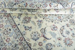 Close-up detail of 2000s Nain rug from Iran / Persia showing Wool weave