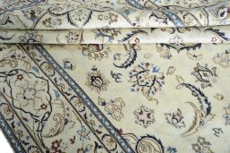 Close-up detail of 2000s Nain rug from Iran / Persia showing Wool weave
