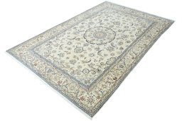 Corner detail of 2000s Nain rug showing border pattern and Wool pile
