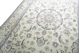 Backside of handmade 2000s Nain rug showing knot structure and weave density